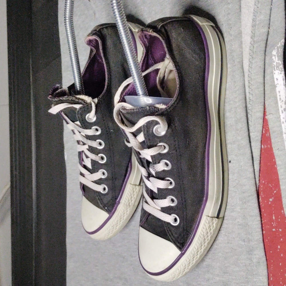 Converse All Star woman size 7 men's size 5 black sneakers with purple interior